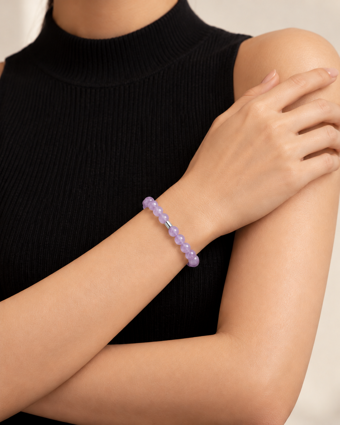 Minimal amethyst bracelet styled with black knitwear